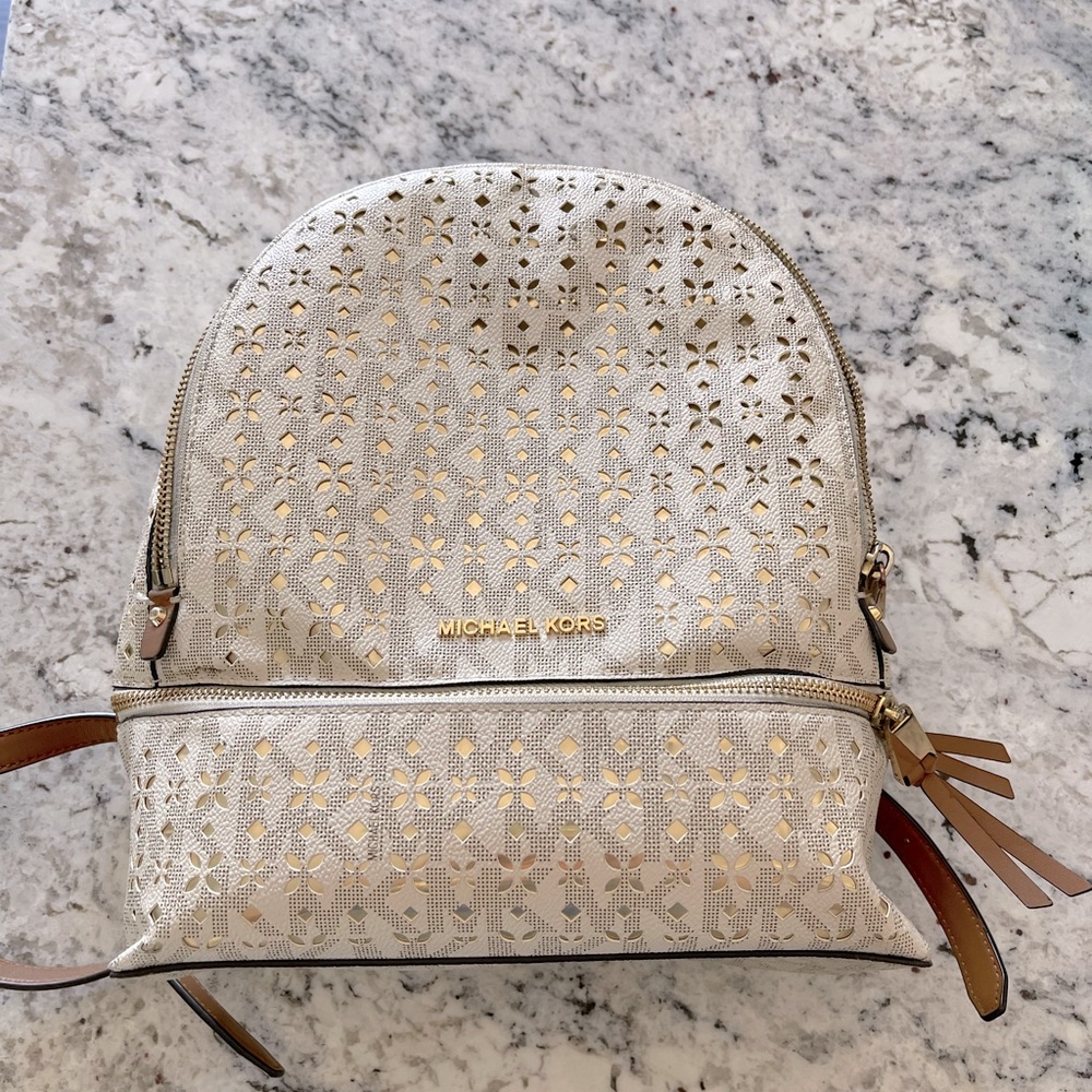 Michael Kors medium size backpack with front zipper broken